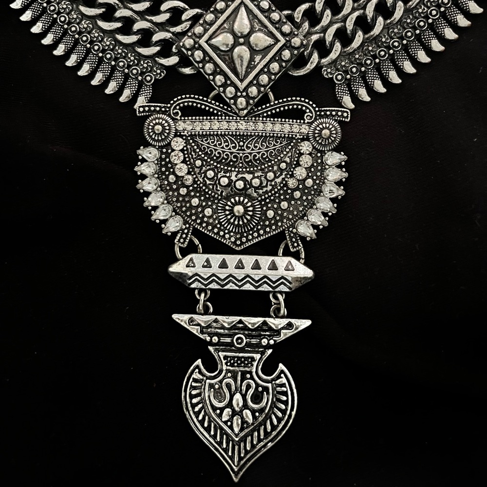 Ornate silver necklace. Costume